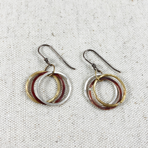 Hoop earrings in copper, brass, and sterling silver from Junk to Jems handmade in Bend, Oregon